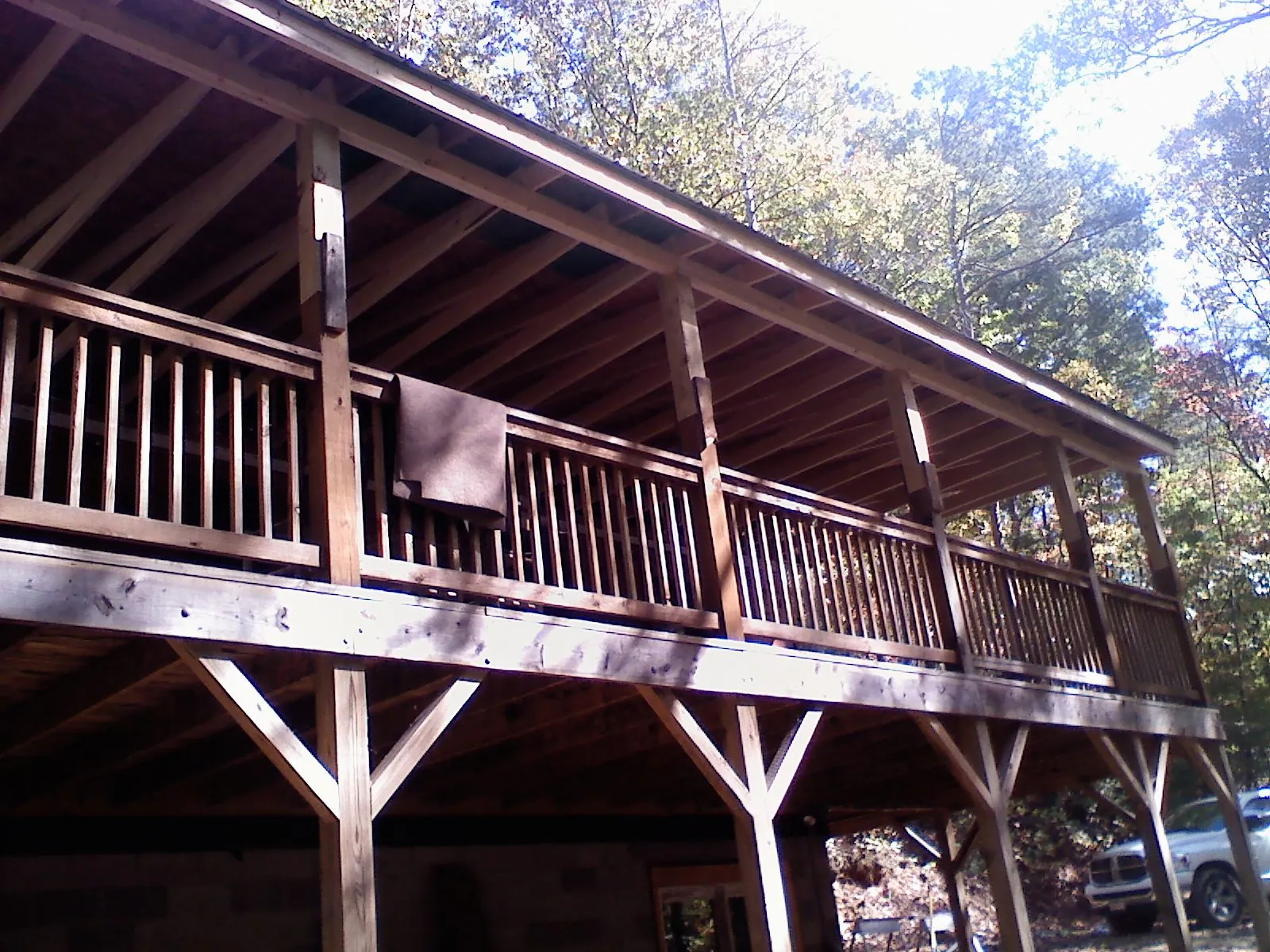 Timber framing under a new elevated porch and deck — Roof Leak Repair in Plantersville by Roofing Brothers